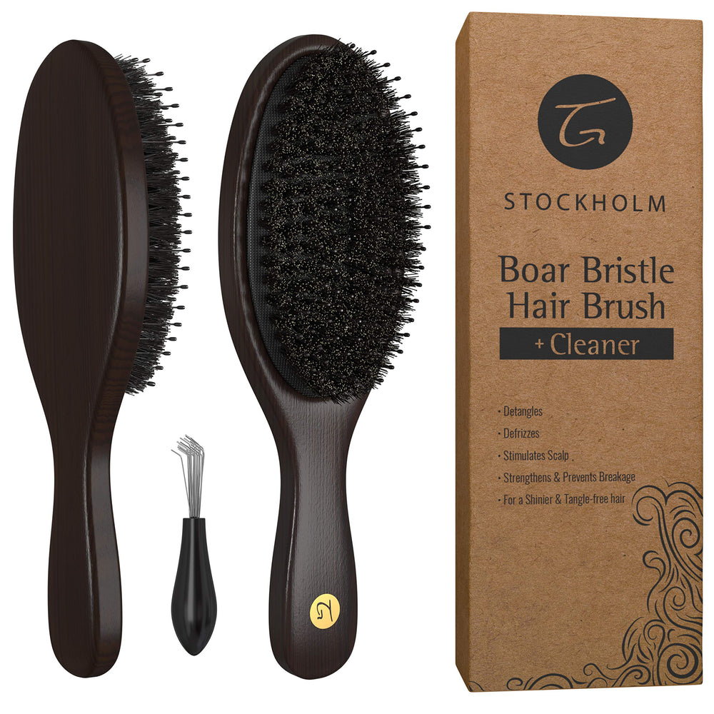 TRULY GENUINE STOCKHOLM hairbrush with wooden handle closeup for comfortable daily grooming.