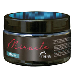 TRUSS Miracle Hair Mask bottle pouring for quick hydration and conditioning.