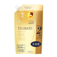 Tsubaki Premium Repair Conditioner bottle promotes detangling and smoothness.