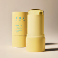TULA Protect Glow sunscreen stick on skin with dewy glow finish