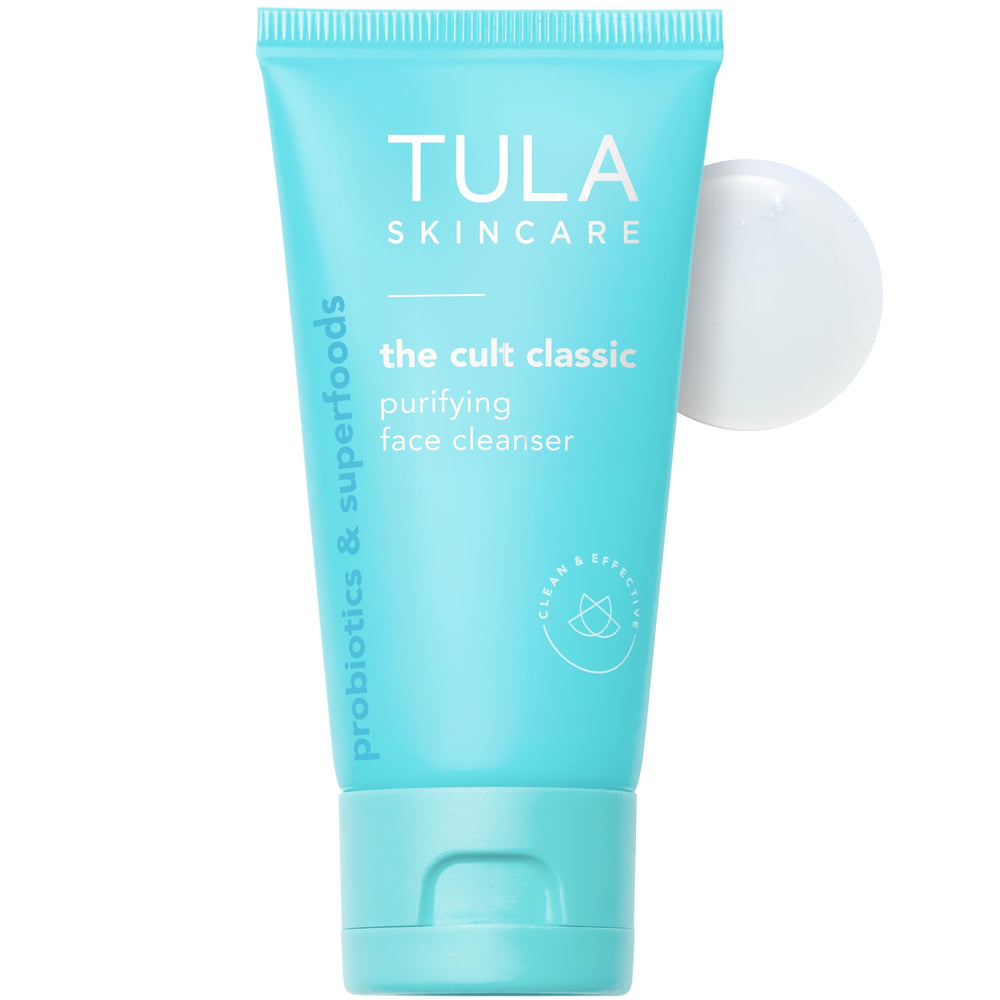 TULA Purifying Face Cleanser travel-size bottle demonstrates gentle cleansing for clear pores