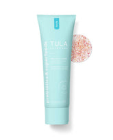 TULA Take Care + Polish bottle close-up for revitalizing body exfoliation.