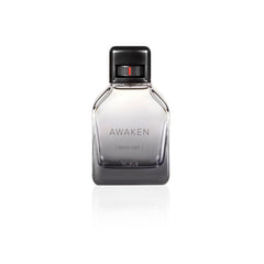TUMI Awaken for Men applying to pulse points for long-lasting scent
