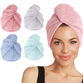 Turbie Twist pink microfiber hair towel close-up shows fast-drying softness.