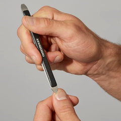 Tweezerman Essential Grooming Kit facial-hair-scissors close-up for precise trimming.
