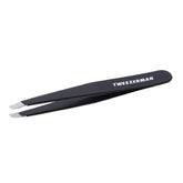 Tweezerman G.E.A.R. Slant Tweezer Midnight tip closeup for precise hair removal