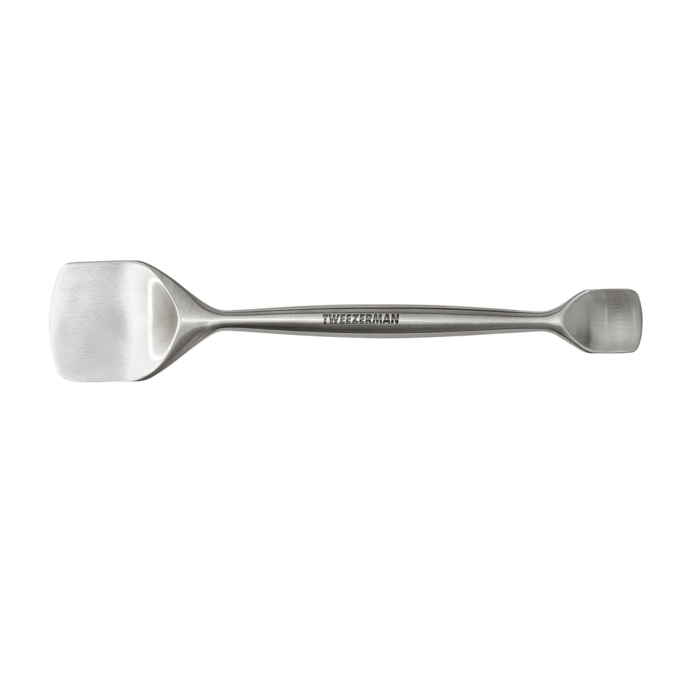 Tweezerman Pore Prep Tool front view, compact metal design for gentle pore cleaning.