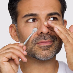 Tweezerman Pore Prep Tool nose-use closeup shows small end for nose areas.