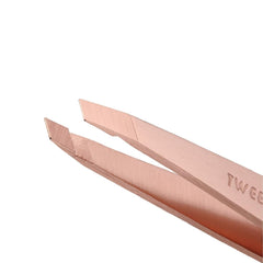 Tweezerman Rose Gold Petite Point Tweezer removes fine hairs precisely.