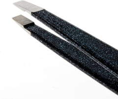 Tweezerman Slant Tweezer at 25-degree angle highlighting ergonomic design for brow shaping