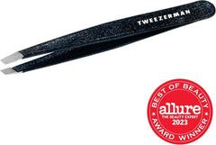 Tweezerman Slant Tweezer in use removing stray brow hairs