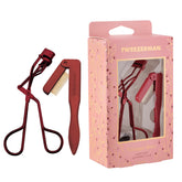 Tweezerman Vintage Rose Lash Curler close-up showing ergonomic handle for precise curling.