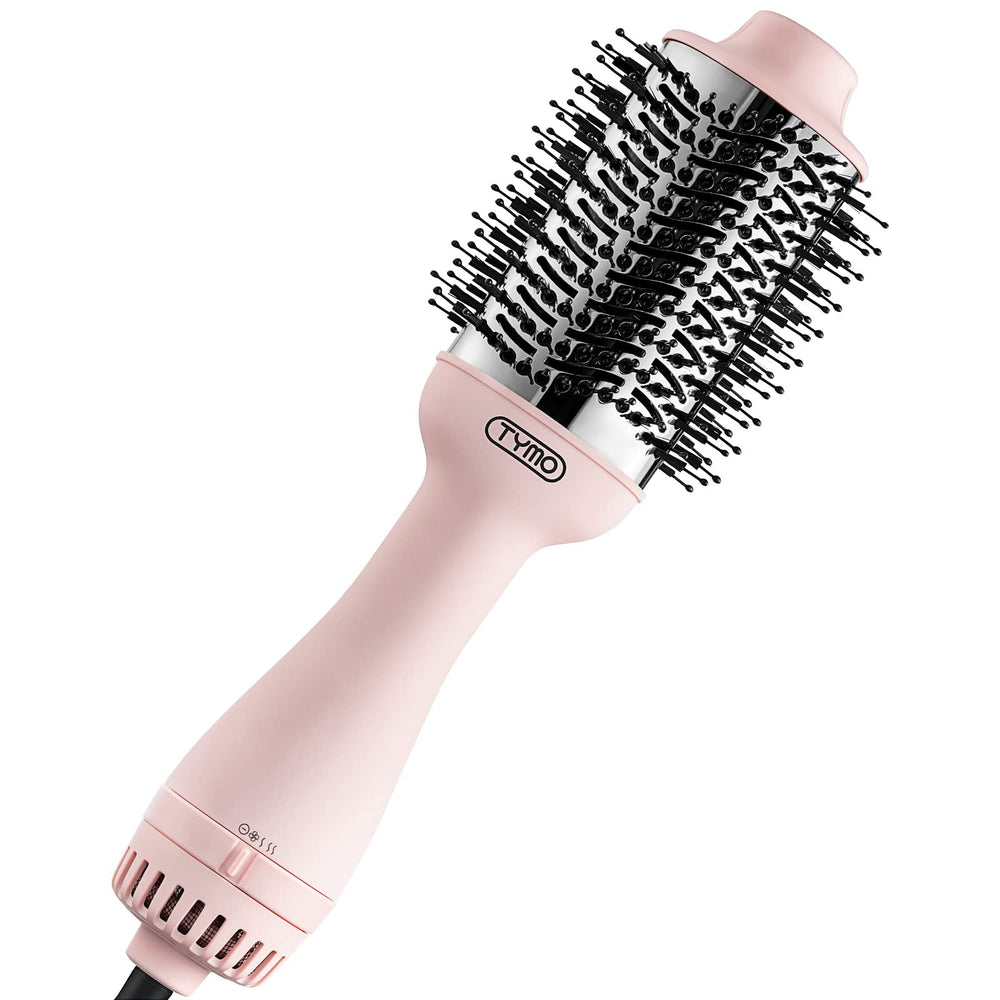 TYMO Pink Volumizer closeup highlights smooth bristles for gentle detangling and shine.