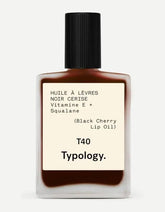 Typology Tinted Lip Oil in Black Cherry bottle delivers glossy, nourishing lip color.