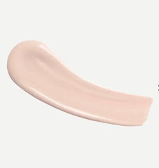 Typology tinted serum application on skin delivering light coverage and hydrated glow.
