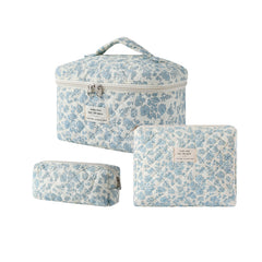 uekeboag 3pcs large travel-quilted makeup bags in light blue ideal for organized cosmetics on trips.