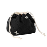 uekeboag cotton quilted makeup bag closeup showcases soft fabric ideal for travel cosmetics.