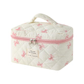 uekeboag floral quilted makeup bag close-up ideal for on-the-go cosmetics touch-ups.