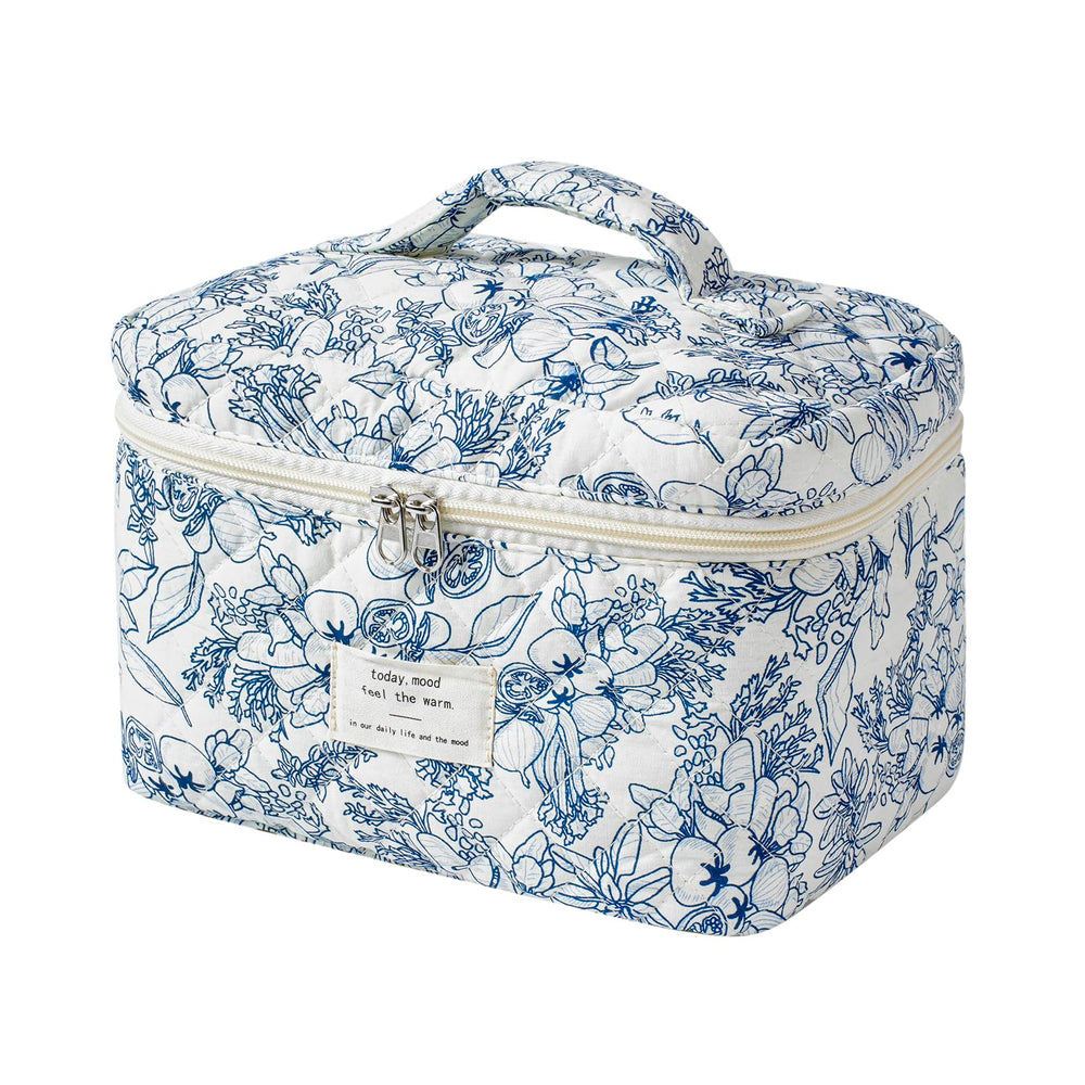 uekeboag large travel quilted makeup bag in navy blue flower; spacious interior for cosmetics.