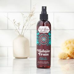 Uncle Funky's Daughter Midnite Train pump-cap enables convenient, mess-free leave-in application.