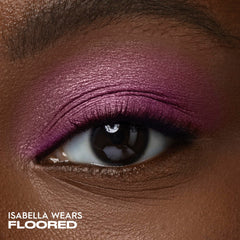 Urban Decay 24/7 Eyeshadow Single swatch demonstrates deep pink shimmer with high-impact finish.