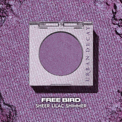 Urban Decay 24/7 Eyeshadow Single Freebird close-up highlights a fine lilac shimmer.