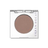 Urban Decay 24/7 Eyeshadow Tease compact front view highlighting durable matte color.
