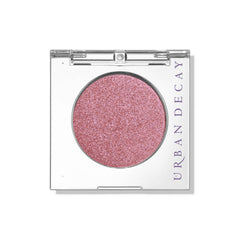 Urban Decay 24/7 Bad Seed powder swatch shows warm pink shimmer for versatile looks