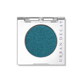Urban Decay 24/7 Longwear Eyeshadow Single Float teal shimmer for smooth, all-day blending.