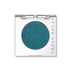 Urban Decay 24/7 Longwear Eyeshadow Single Float teal shimmer for smooth, all-day blending.