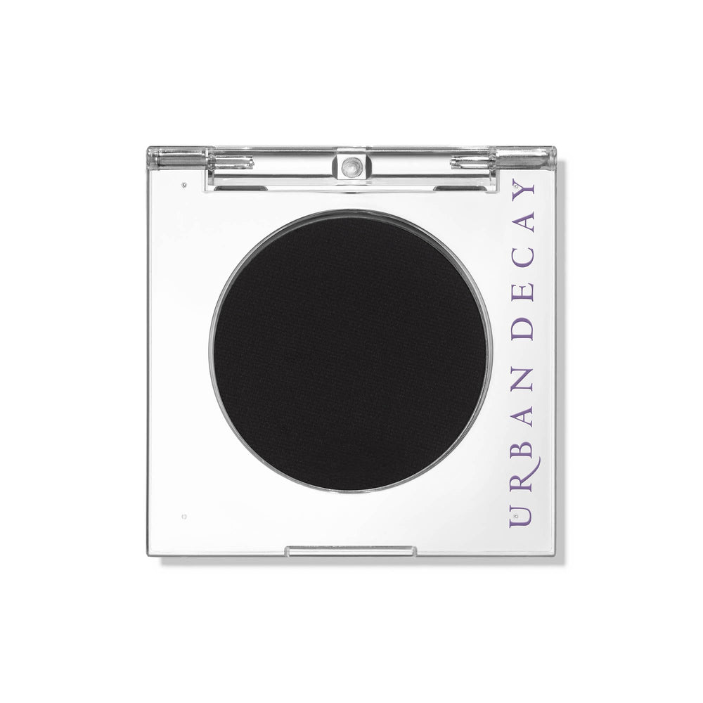 Urban Decay 24/7 Eyeshadow Single Blackout compact close-up showing deep matte pigment for smoky eyes.