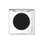 Urban Decay 24/7 Eyeshadow Single Blackout compact close-up showing deep matte pigment for smoky eyes.