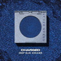 Urban Decay 24/7 Eyeshadow Single Charged close-up, velvet-soft texture enhances easy blending.