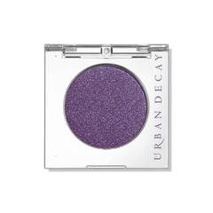 Urban Decay 24/7 shadow single in deep purple shimmer with blue shift for crease-free, long-wear color.