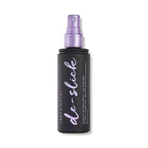Urban Decay De-Slick bottle front shows oil-control matte setting spray.