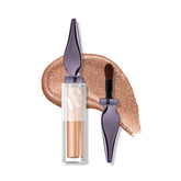 Urban Decay Glaze-On Space Cowboy swatches show light champagne gold shimmer for all-day glow.