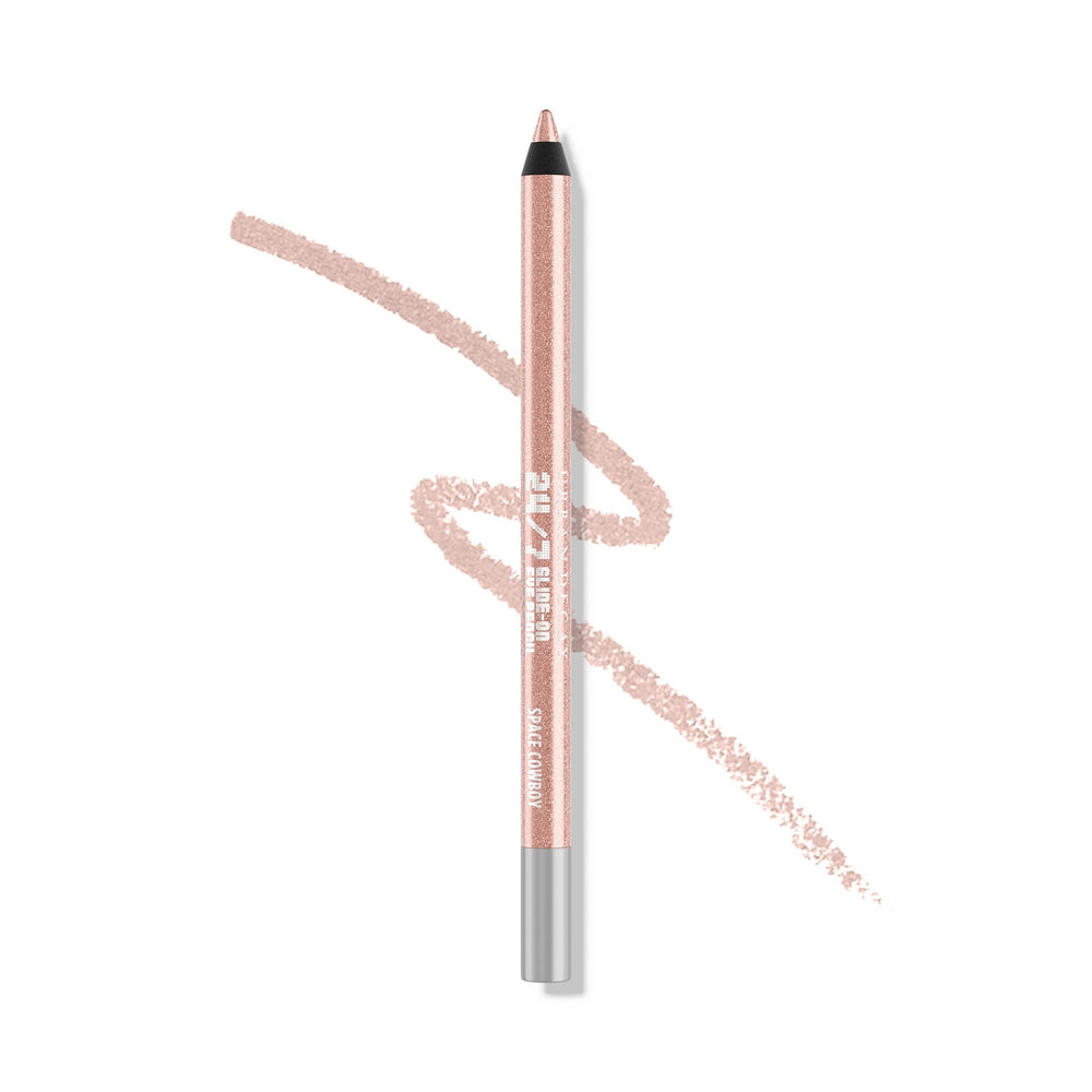 Urban Decay Space Cowboy pencil close-up showing peach shimmer and silver sparkle for soft daytime looks