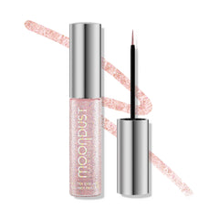 URBAN DECAY Moondust Grind bottle with light pink iridescent glitter for precise application