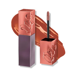 Urban Decay Vice Lip Bond Toy With Me bottle close-up showing long wear shine.