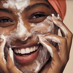 Urban Skin Rx cleansing bar closeup texture highlights gentle exfoliation for smoother, more radiant skin.