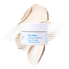 Ursa Major Forest Alchemy Eye Cream jar closeup, creamy texture for hydrating under-eye skin.