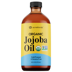 Us Naturals Jojoba Oil front-view bottle highlighting purity and hydration potential