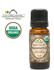US Organic frankincense oil amber bottle highlighting premium steam-distilled purity.