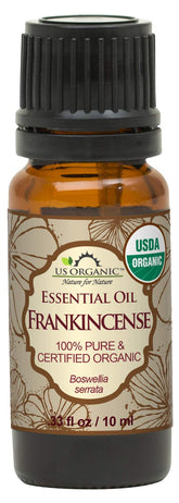 US Organic frankincense oil bottle closeup shows pure resinous aroma for calming diffusions.