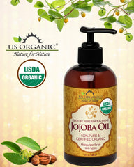 US Organic Jojoba Oil pour close-up highlights fast absorption for dry skin.