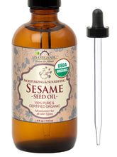 US Organic sesame seed oil in amber glass bottle with dropper for precise application.
