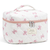 UUYUYU makeup bag floral quilted pink bow for travel organization.