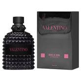 Valentino Uomo Born In Roma Extradose bottle being poured for a lasting evening scent.