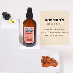 Hands applying VanMan Protection Oil to hair lengths for smoothness.