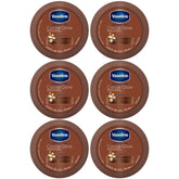 Vaseline Cocoa Glow pack shot with six travel-size tubes for soft skin.